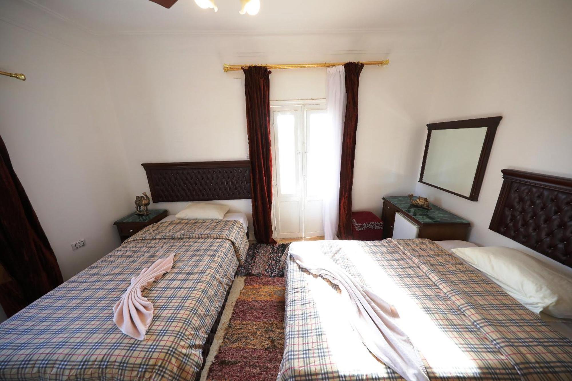 Pyramids Loft Guesthouse Kairo Ruang foto