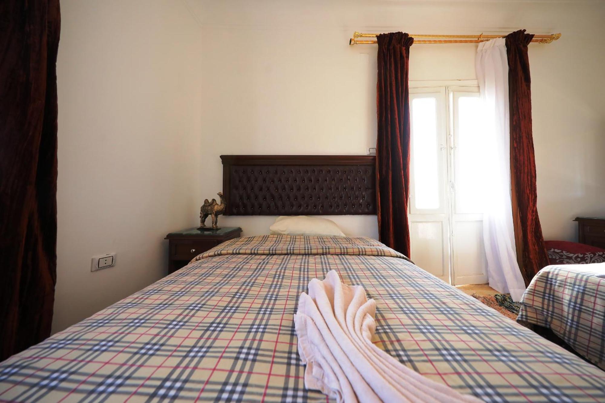 Pyramids Loft Guesthouse Kairo Ruang foto