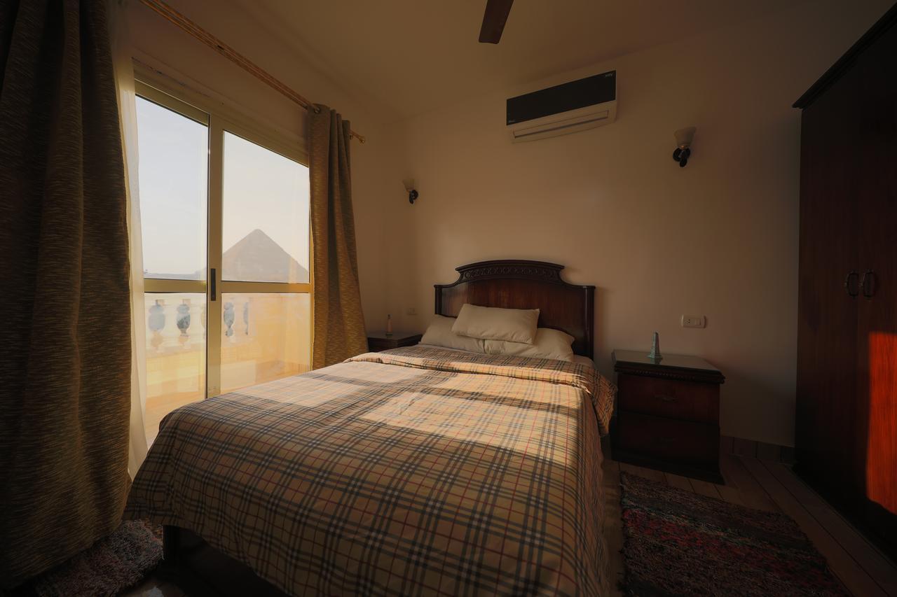 Pyramids Loft Guesthouse Kairo Bagian luar foto