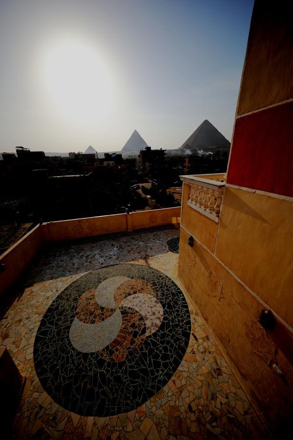 Pyramids Loft Guesthouse Kairo Bagian luar foto