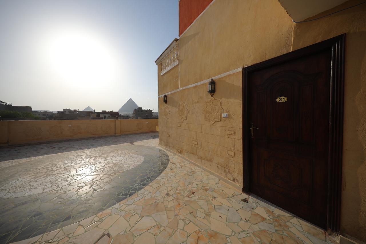 Pyramids Loft Guesthouse Kairo Bagian luar foto