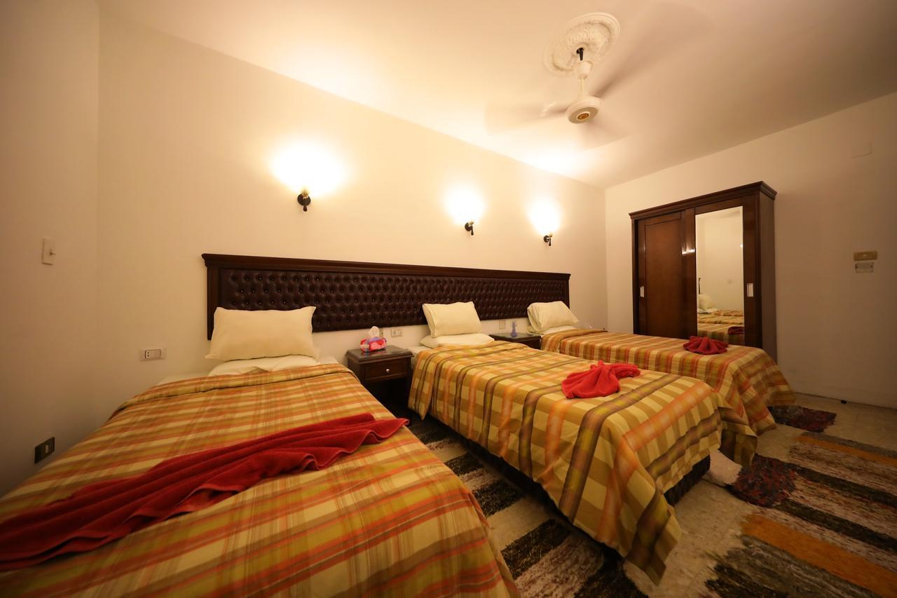 Pyramids Loft Guesthouse Kairo Bagian luar foto