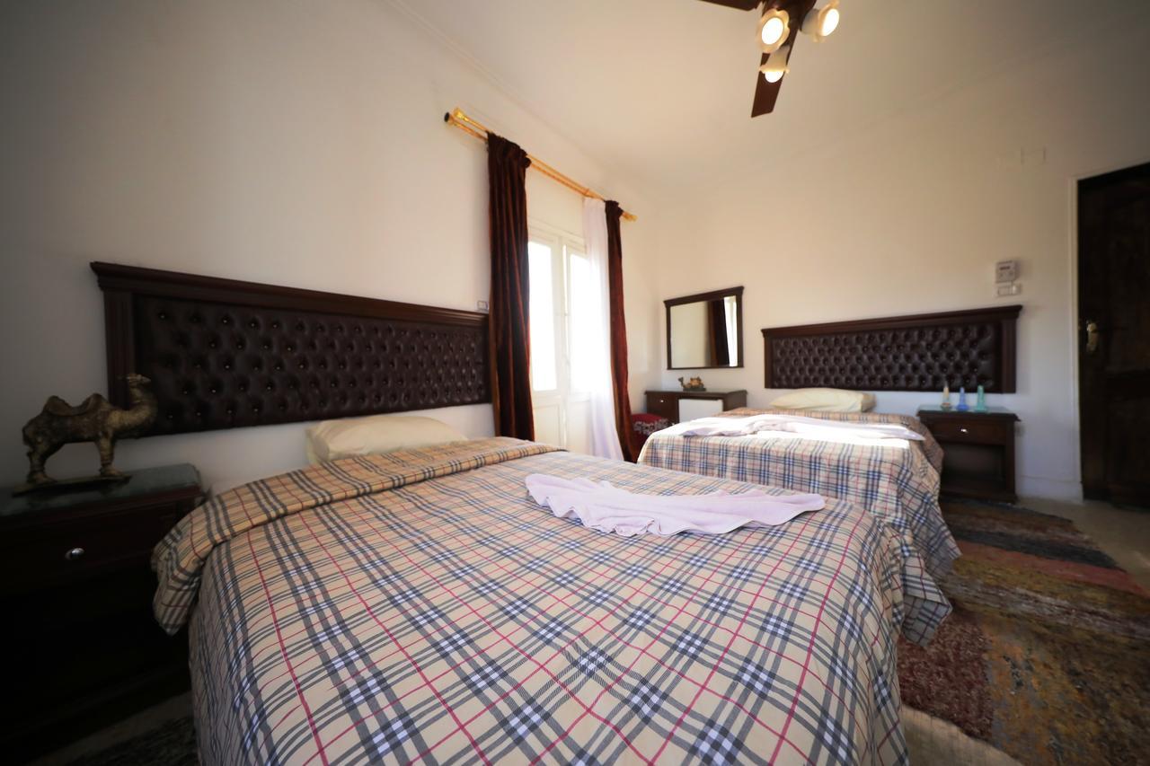Pyramids Loft Guesthouse Kairo Bagian luar foto