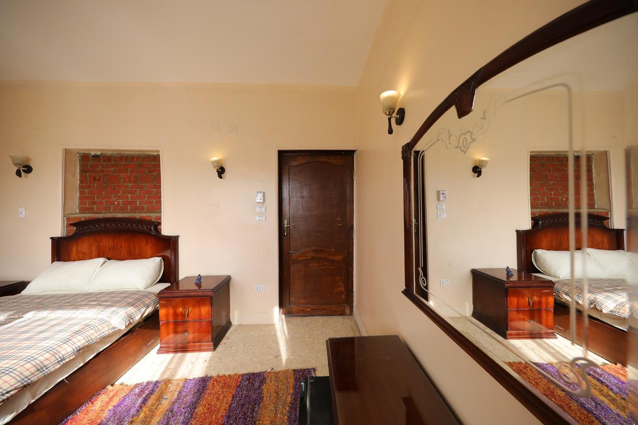Pyramids Loft Guesthouse Kairo Bagian luar foto