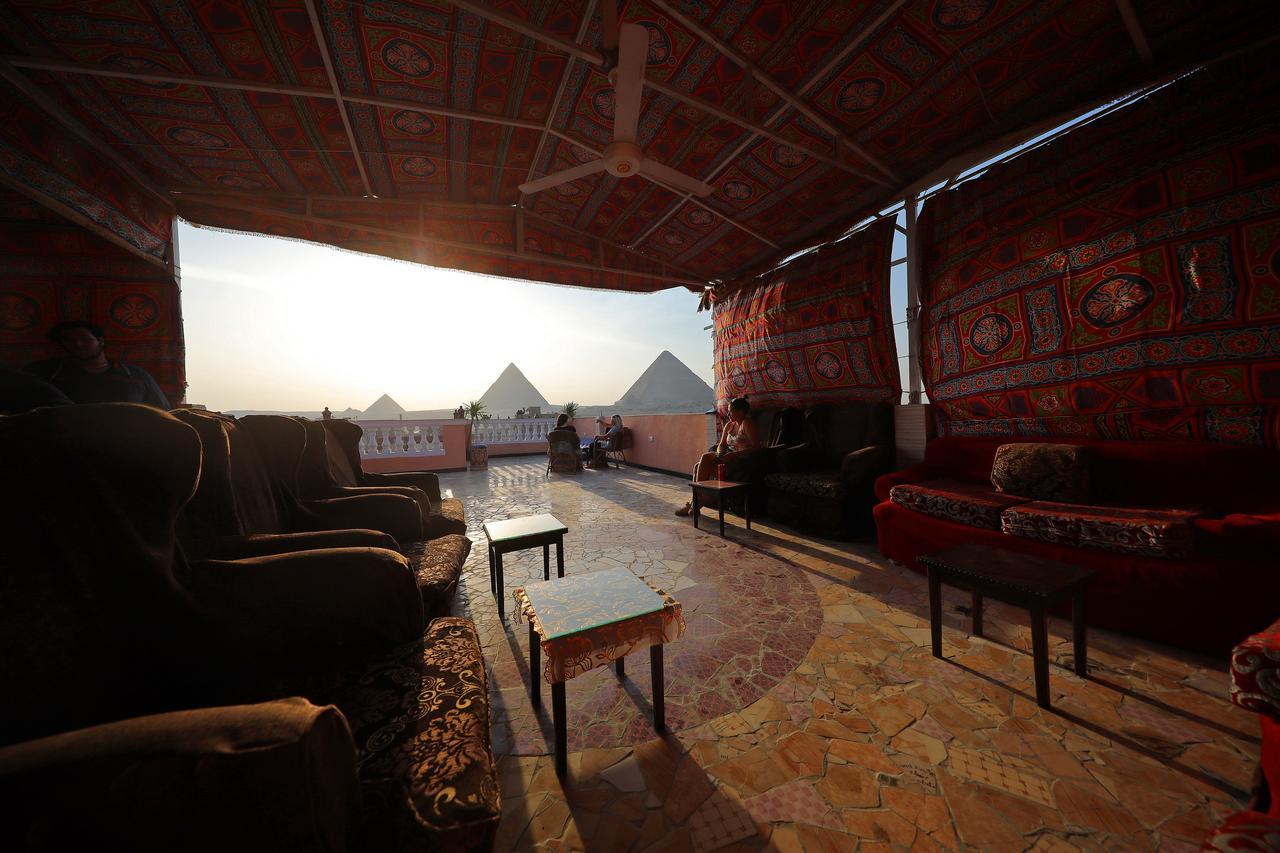 Pyramids Loft Guesthouse Kairo Bagian luar foto
